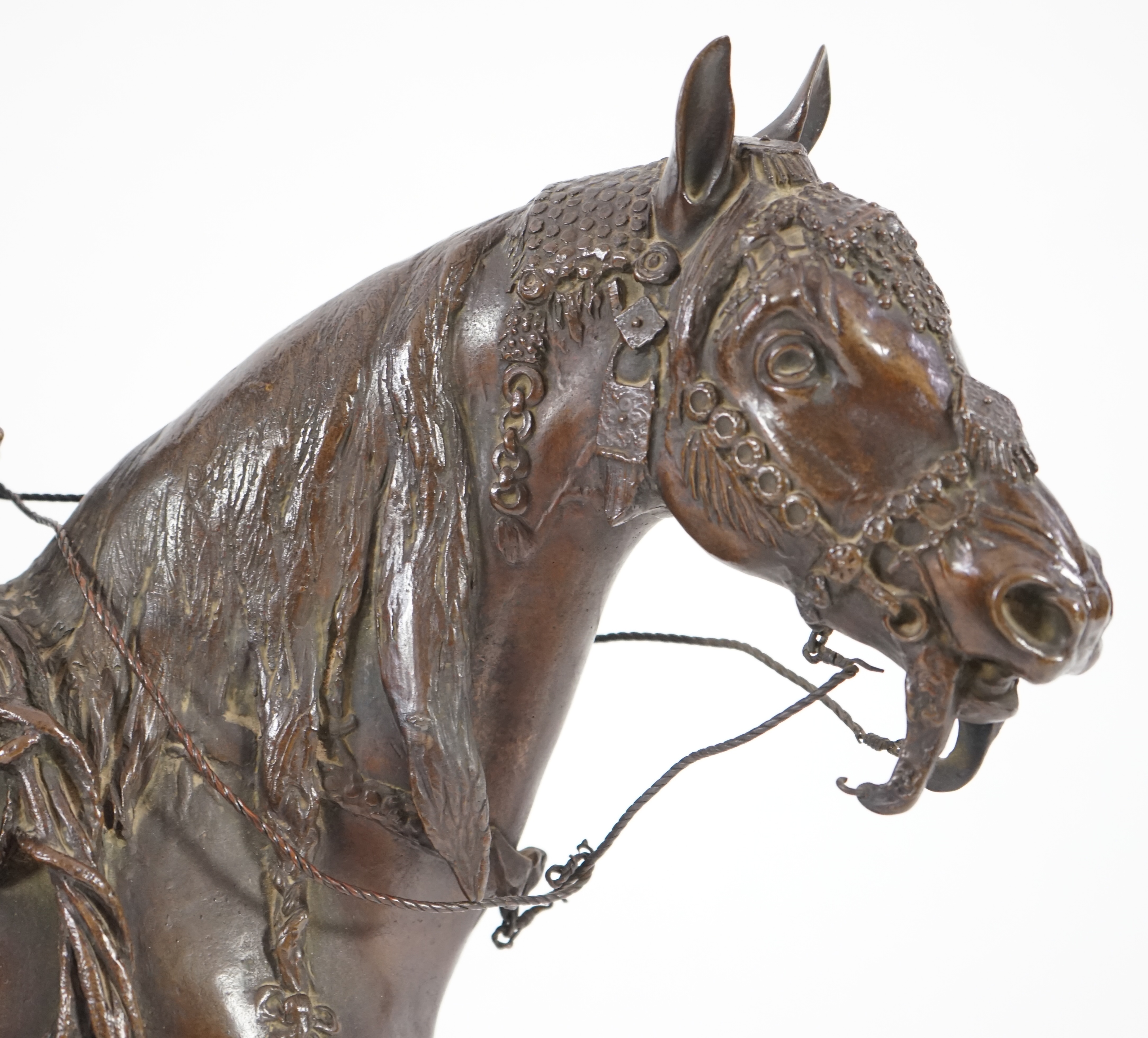 Walter Winans (St. Petersburg, 1852-Parsloe Park, Essex, 1920), a cast bronze of the artist, as a cowboy, riding the Arab stallion Skowronek, 50cm wide, 66cm high, overall 79.5cm high